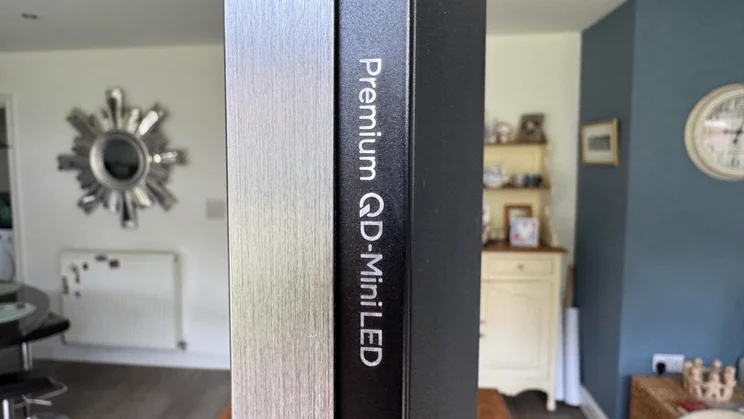 The Premium QD-Mini LED logo on the side of the TCL C8K QD-Mini LED TV