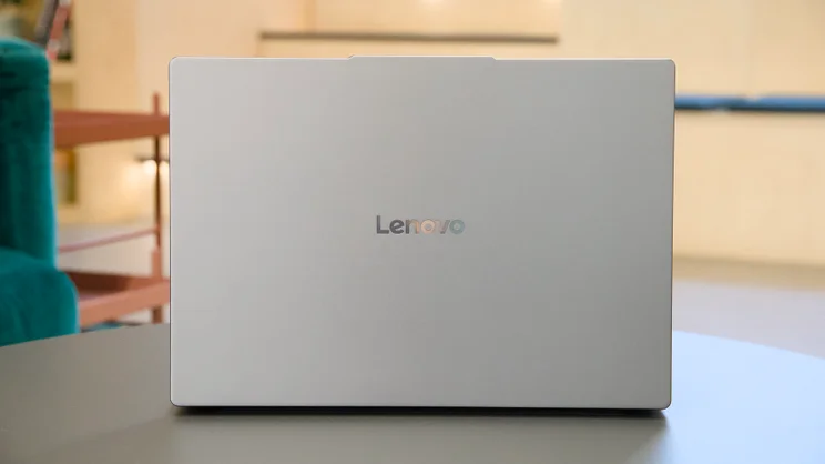 The Lenovo IdeaPad 3x 2025 with lid open, pictured from the rear