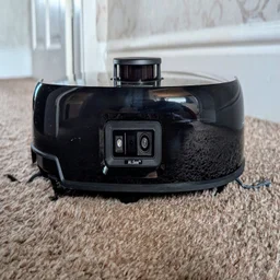 A photograph of the front of the Eufy E25 robot vacuum cleaner