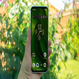Fairphone 6 in hand, front view with the display on