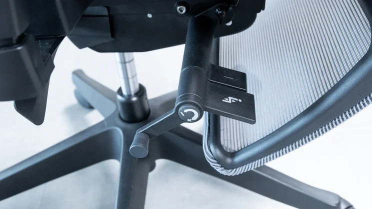 A closeup of the The Flexispot C7 office chair's seat height lever