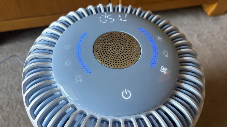 The display of the Levoit Sprout air purifier, switched on