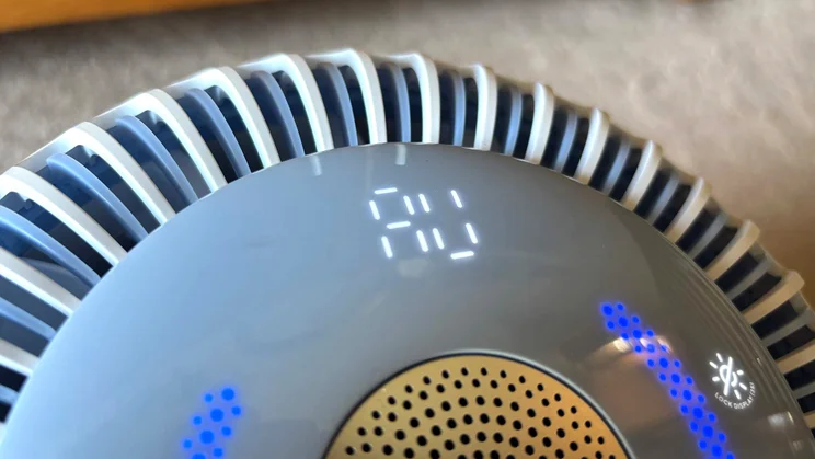 A closeup of the Levoit Sprout air purifier's display