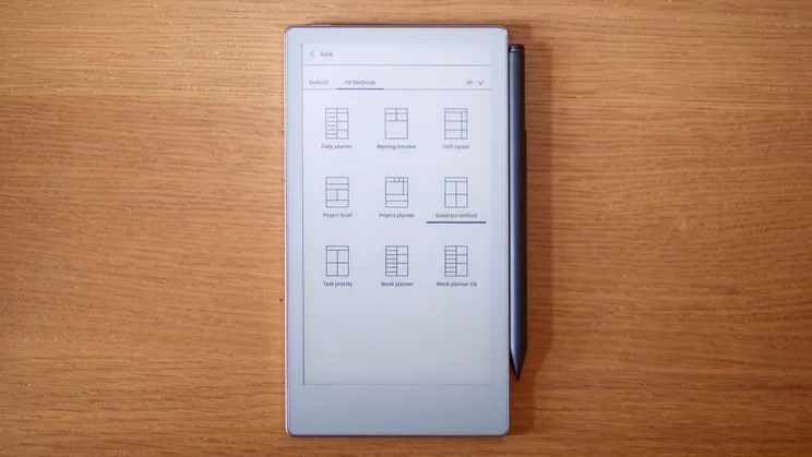 Remarkable Paper Pro Move on a wood surface, showing the different templates available