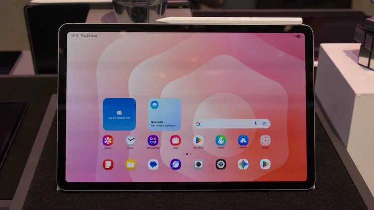 The Samsung Galaxy Tab S11 pictured from the front with the S Pen attached to its top edge