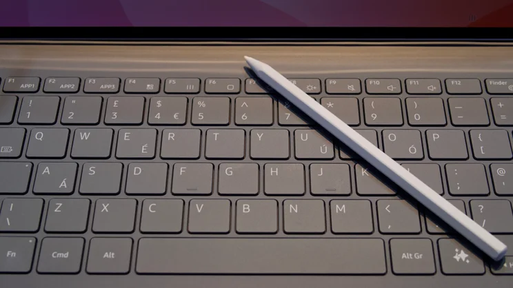 The Samsung Galaxy Tab S11 Ultra's redesigned S Pen stylus lying on top of its new keyboard case