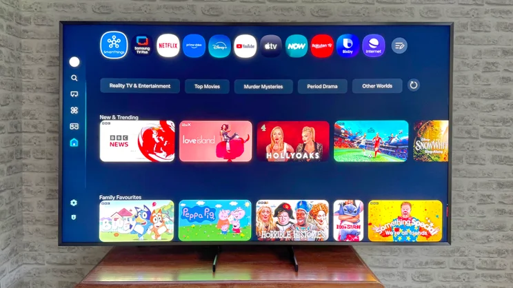 The Samsung 75QN900F pictured showing its fullscreen Tizen UI