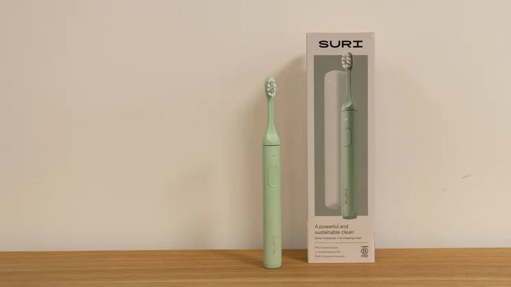 The Suri 2.0 electric toothbrush alongside its box