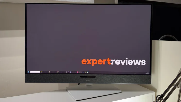 The Dell 32 Plus monitor pictured from the front with the stand at an angle