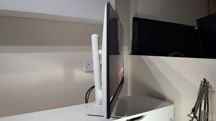 The Dell 32 Plus monitor pictured from the left side