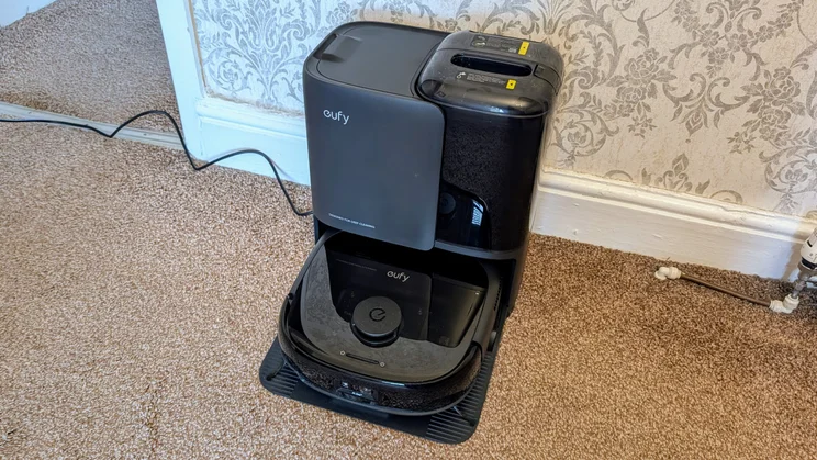 The Eufy 25 in its docking station