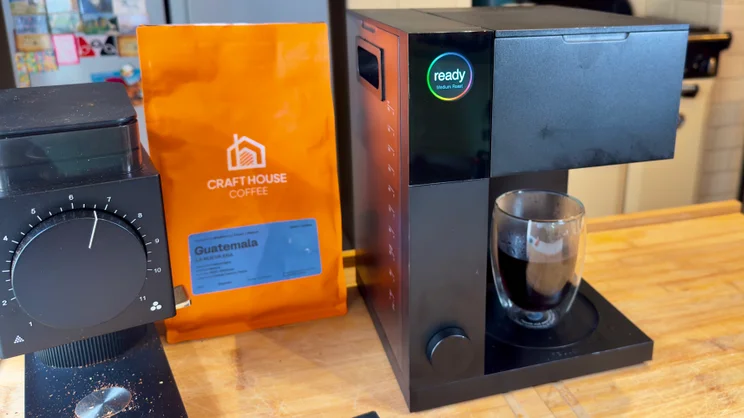 The Fellow Aiden coffee machine next to a Fellow grinder