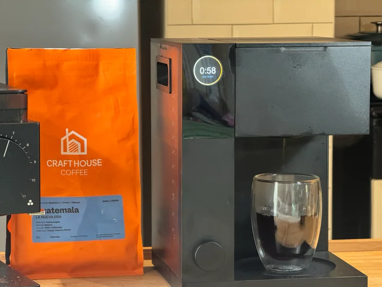 The Fellow Aiden coffee machine pictured brewing into a single cup