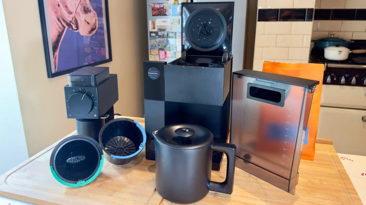 The Fellow Aiden coffee machine with all its components spread out on a table