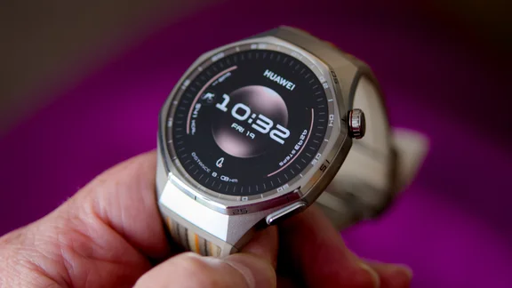 The Huawei Watch 6 Pro held at a slight angle