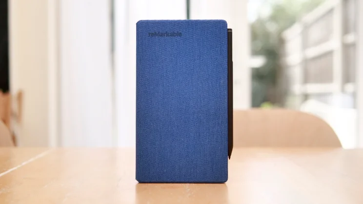 The Remarkable Paper Pro Move in a blue case on a kitchen table