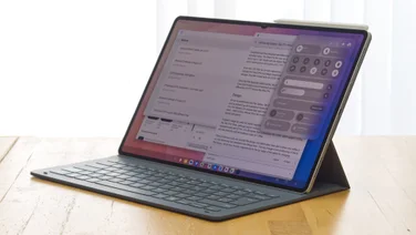 The Samsung Galaxy Tab S11 Ultra pitured from the front in its keyboard case