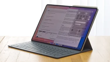 The Samsung Galaxy Tab S11 Ultra pitured from the front in its keyboard case