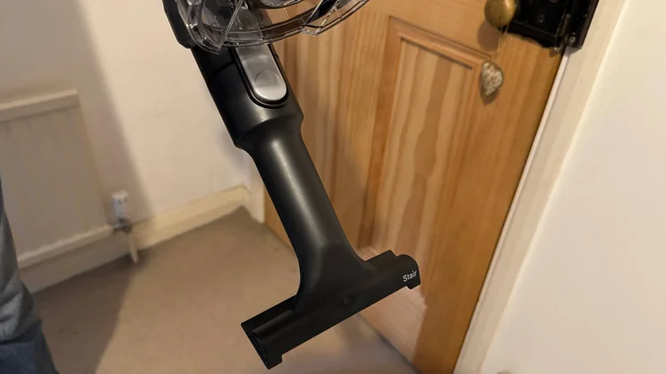 A close up of the VAX HomePro Detect Pet-Design vacuum cleaner's stair attachment