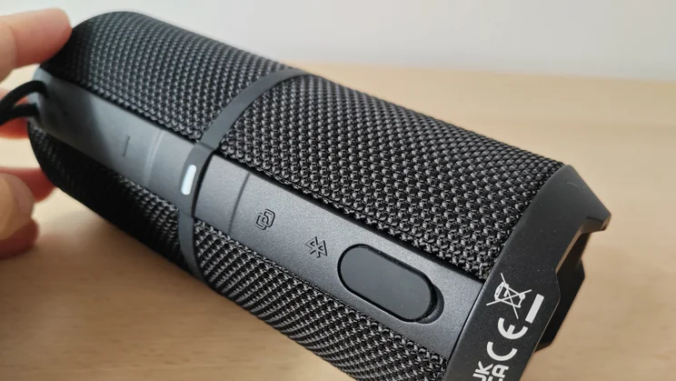 The physical controls on the side of the AO Portable Wireless Speaker
