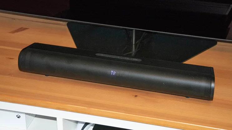 The Creative Stage Pro soundbar underneath the Philips OLED809 TV