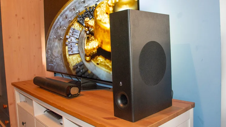 The Creative Stage Pro soundbar and subwoofer connected to the Philips OLED809 TV viewed from the right-hand side