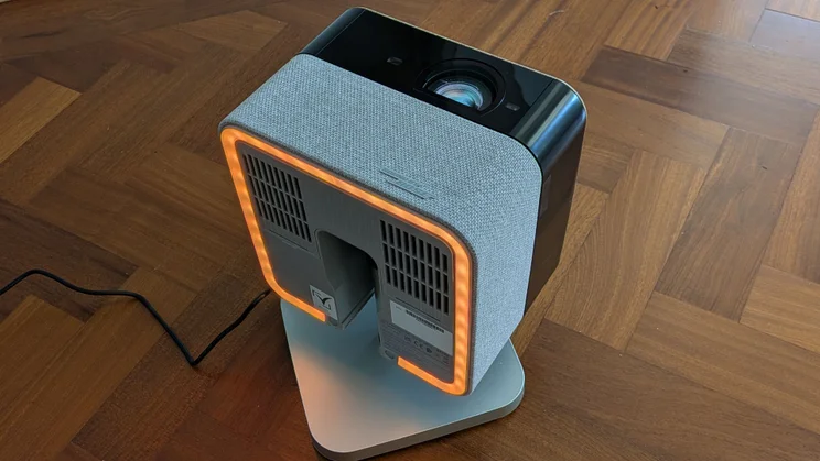 The ambient light on the underside of the Epson Lifestudio Flex EF-72 4K projector glowing orange