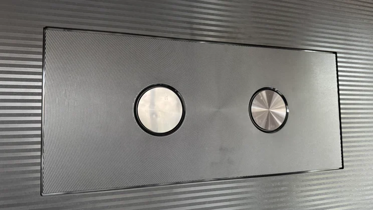The subwoofer speakers on the rear of the Hisense 116UX RGB Mini LED TV