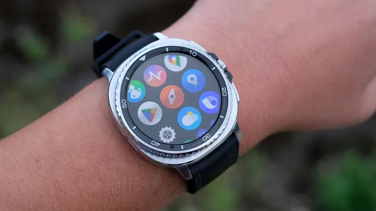 The Samsung Galaxy Watch 8 Classic being worn while displaying various Wear OS apps