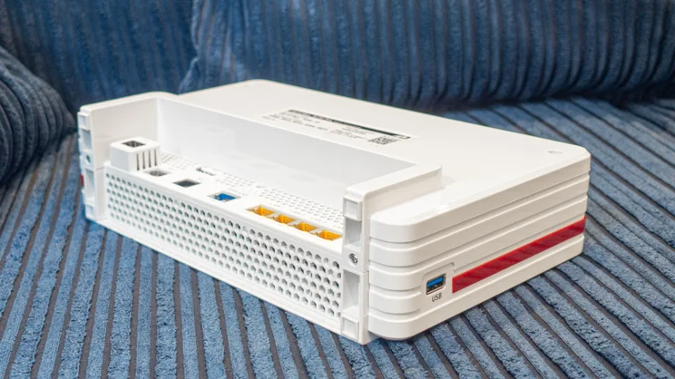 The AVM Fritz!Box-5690 Pro pictured from underneath, showing a close up of its USB-A port