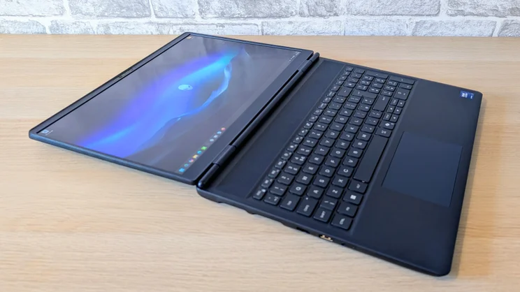 Alienware 16X Aurora - lid open 180 degrees and laid flat on a desk