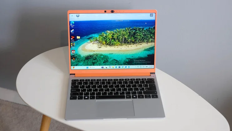 The Framework Laptop 13, open, pictured from the front on an oval white table