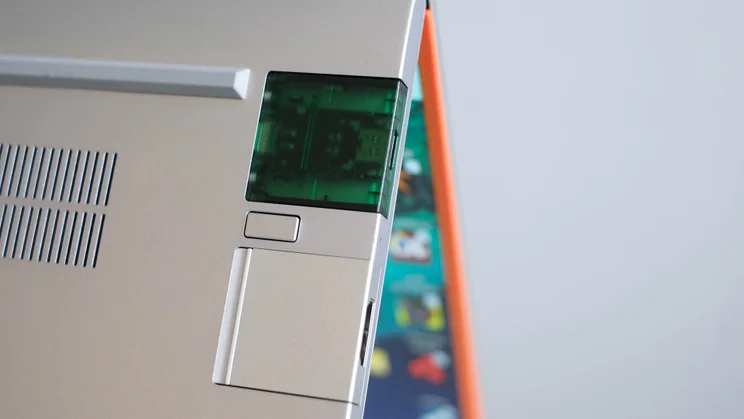 A photography showcasing the Framework Laptop 13's modular expansion card system