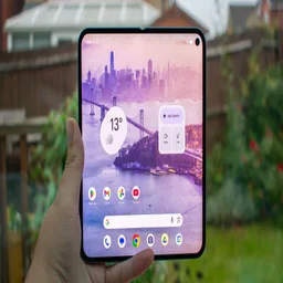 Google Pixel 10 Pro Fold unfolded in hand, display on