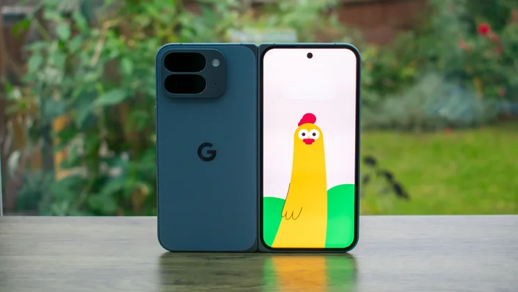 Google Pixel 10 Pro Fold unfolded on a table, rear view with an animation on the cover display