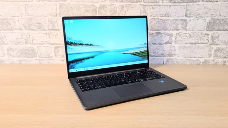 LG Gram Book AI, open on a wood desk, facing to the right side of the frame