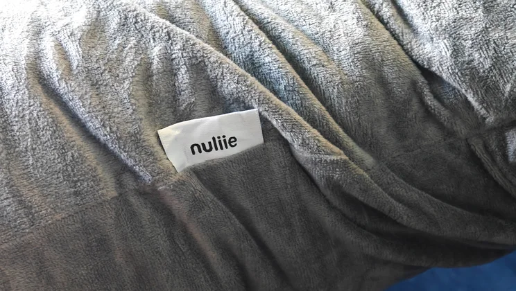A closeup of the label on the Nuliie Pregnancy Pillow