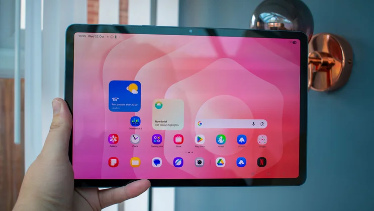 Samsung Galaxy Tab S11 in hand, front view with the display on