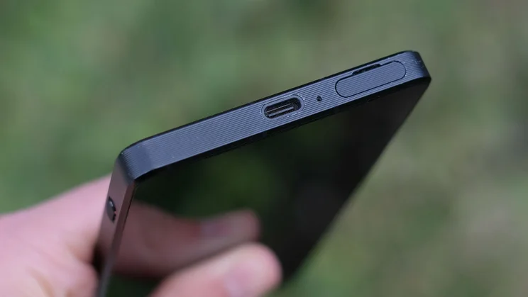 Sony Xperia 1 VII in hand, showing the bottom edge and charging port