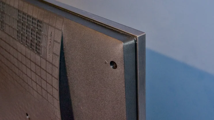 A close up of the TCL C7K's top left corner, pictured from the rear