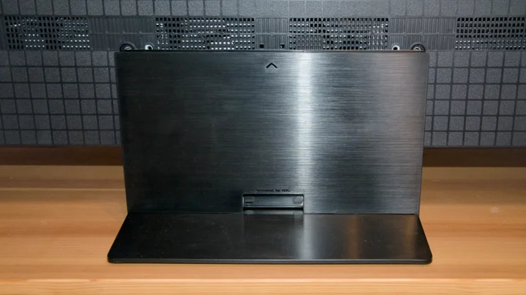 The central stand of the The TCL C7K TV, pictured from the rear