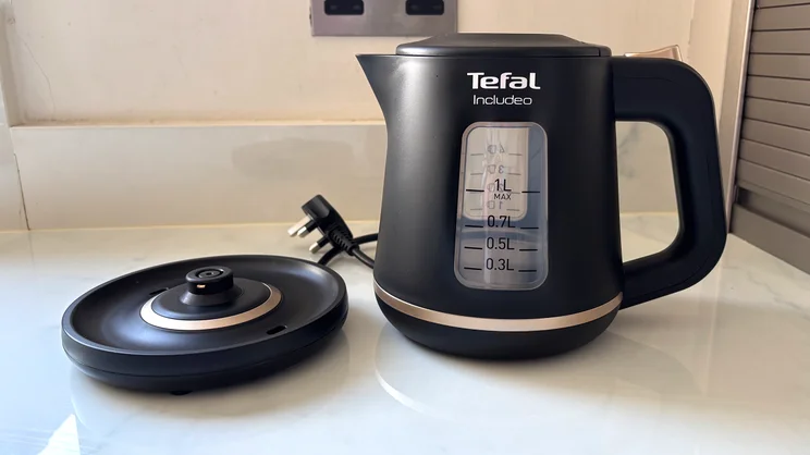 The Tefal Includeo Kettle on a kitchen worktop, alongside its base
