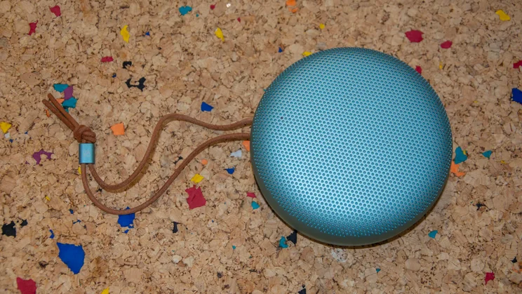 The Bang & Olufsen A1 3rd Gen Bluetooth speaker on a cork table