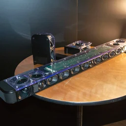JBL Bar 1300 MkII soundbar and rear speakers with all the drivers visible