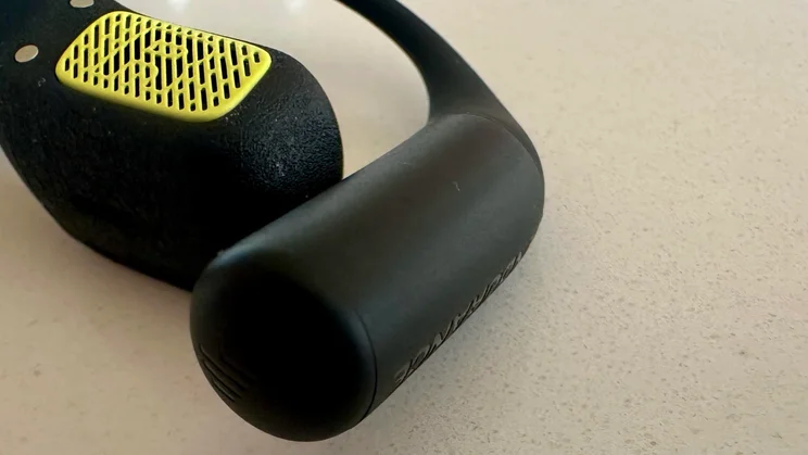 Close-up shot of the battery section of the JBL Endurance Zone open-ear headphones that wraps around the back of your ear