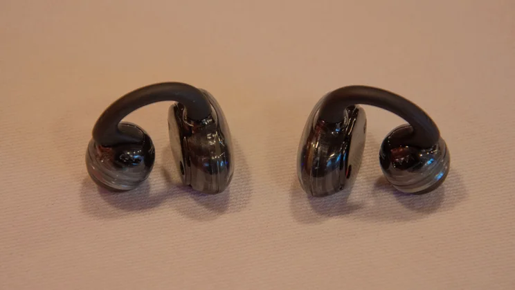 JBL Soundgear Clips open-ear headphones on a table