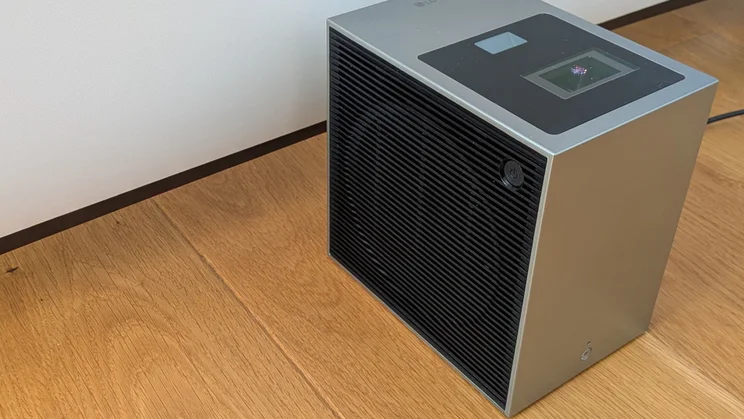 Side view of the LG CineBeam S 4K projector displaying its power button