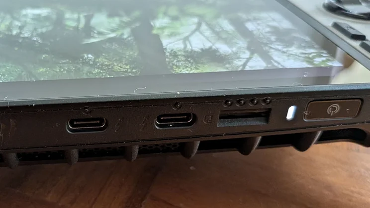 The two USB-C ports, SD card slot, power button and ventilation system on the top ridge of the MSI Claw 8 AI+ A2VM gaming handheld