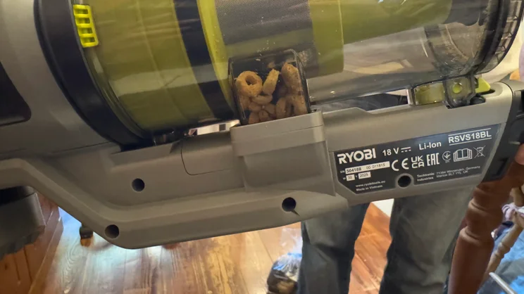 A close up of the blockage caused by vacuuming cheerios in the Ryobi 18V ONE+ Cordless Stick