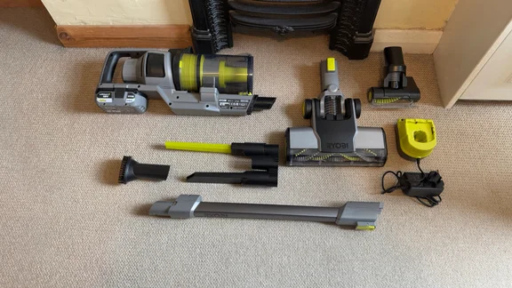 An overhead shot of the Ryobi 18V ONE+ Cordless Stick and all its accessories